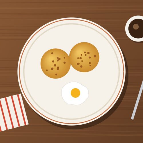 Bolones de verde ecuatorianos con huevo frito y café