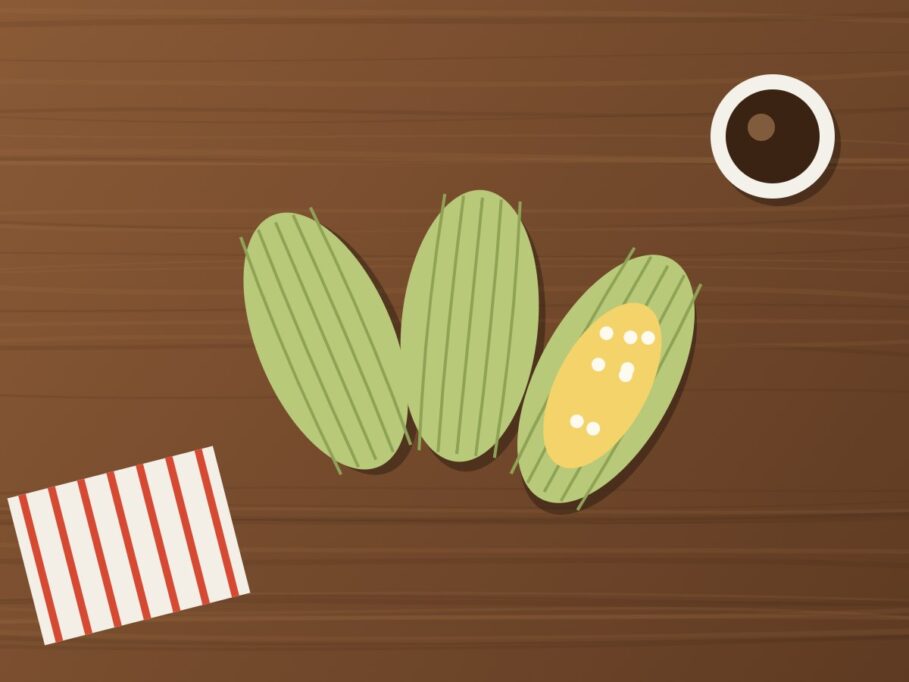 Humitas ecuatorianas en hoja de choclo, una abierta, con café