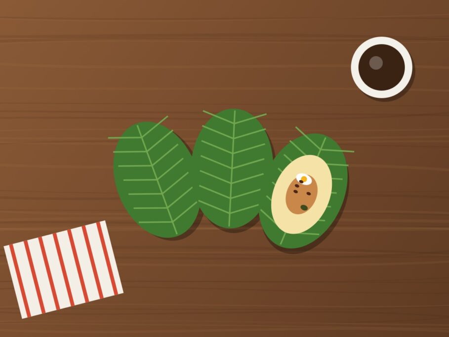 Tamales ecuatorianos en hoja de achira, uno abierto con relleno, y café